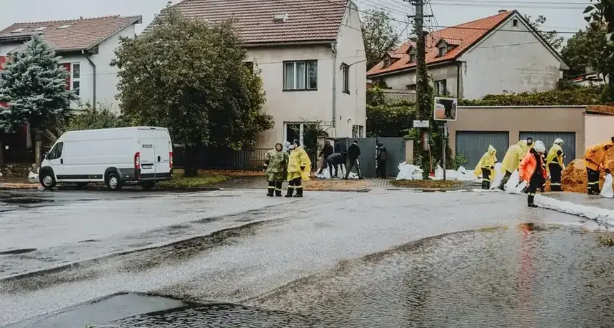 Emergency response crew managing a residential water main break flood